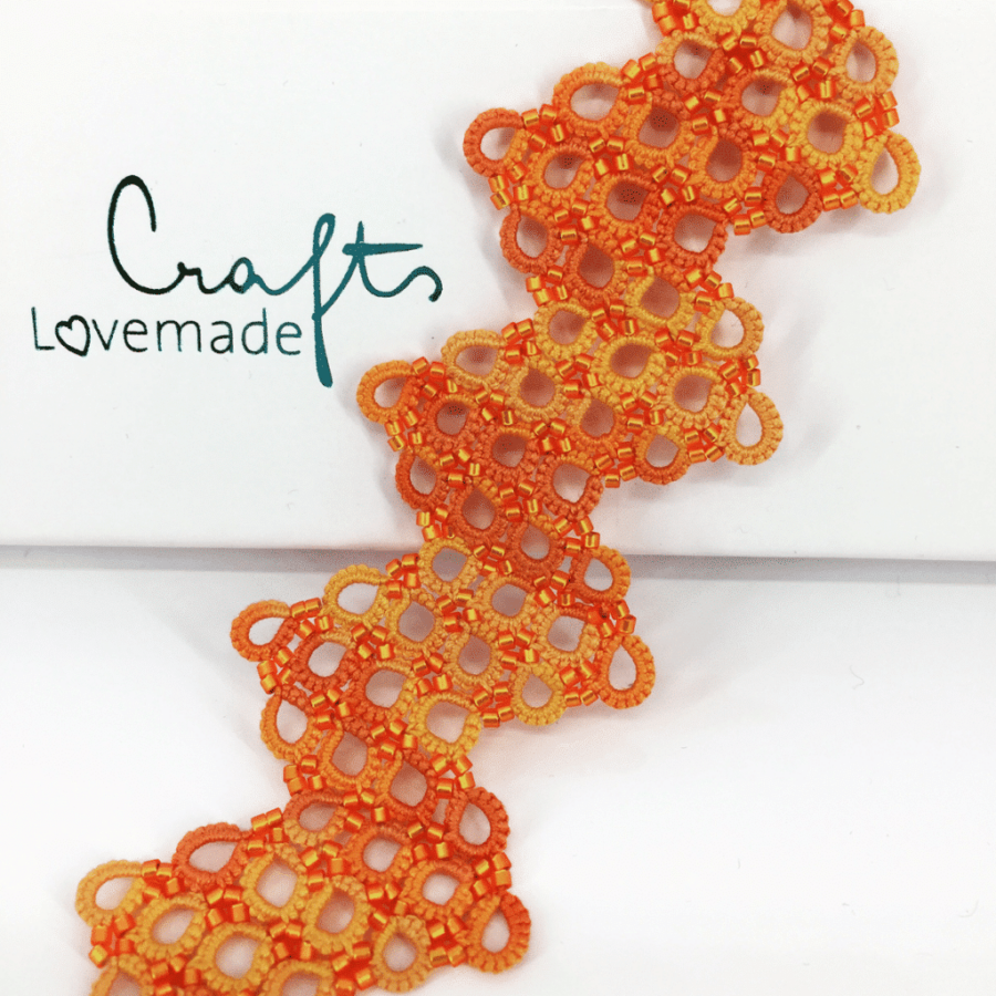 Armband criss cross orange